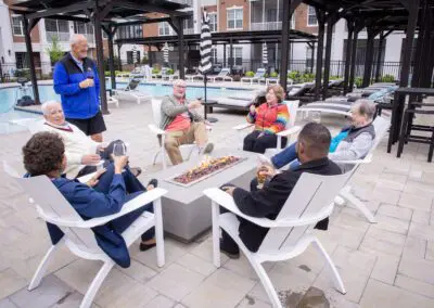 Friends enjoying time outdoors by a pool